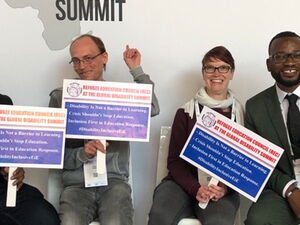 Vier Teilnehmer*innen des Global Disability Summit in Berlin